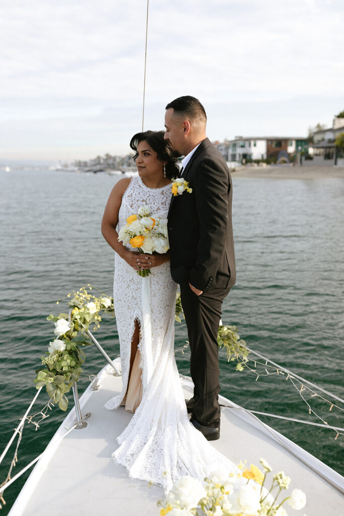 Luxury sailboat elopement in Newport Beach, CA captured by by Gracie Wilson Photography.